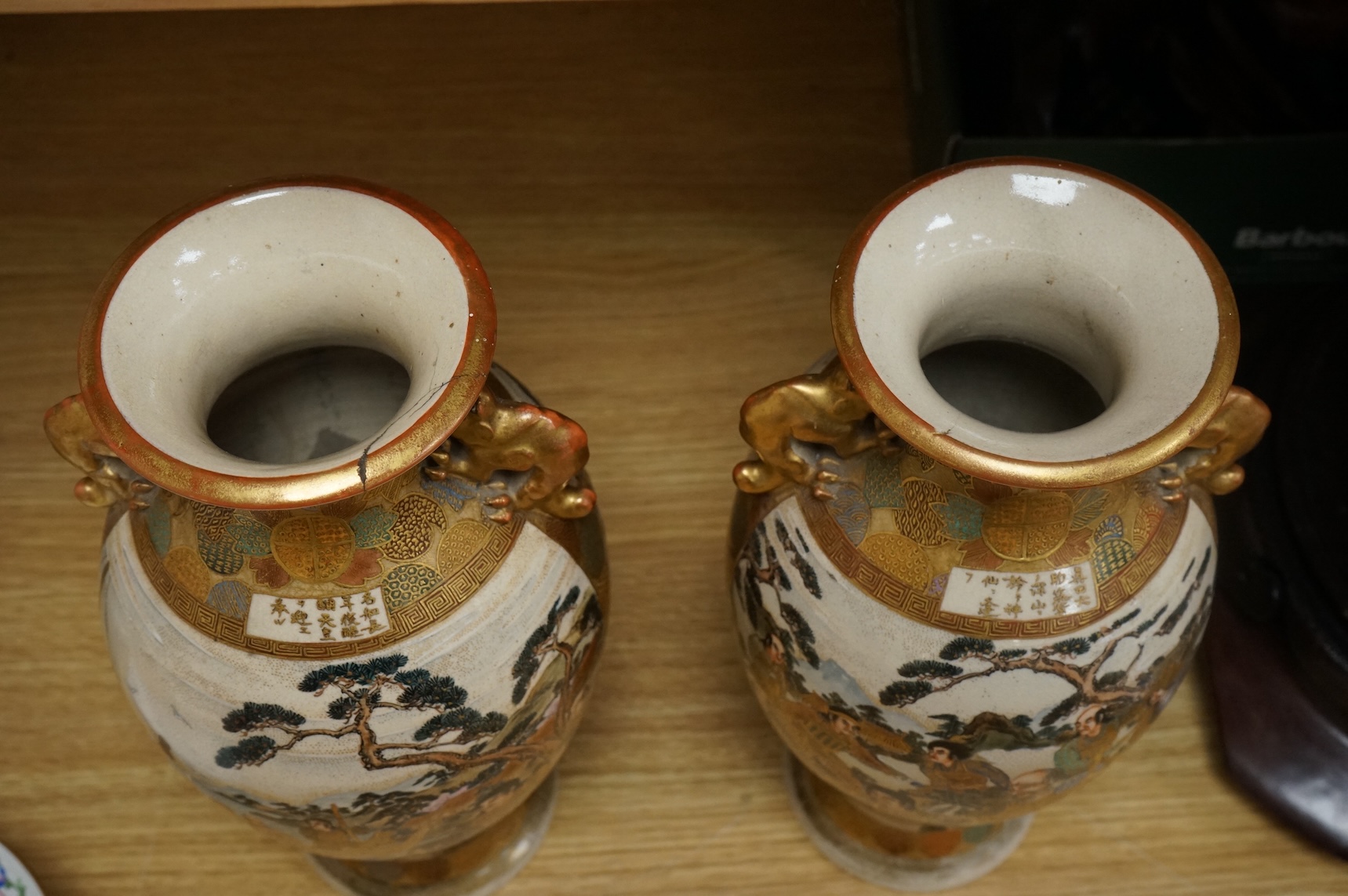 A pair of Japanese Satsuma pottery vases, Meiji period, 31cm high